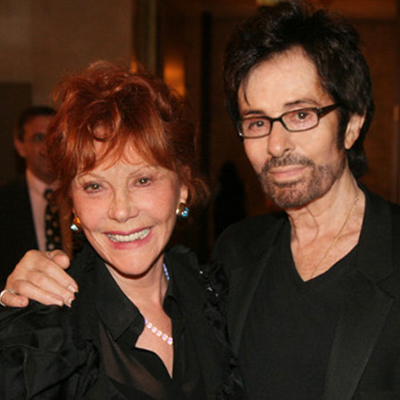 It was mambo-mania Saturday night at the elegant Dorothy Chandler Pavilion when Los Angeles dance “angel,” Glorya Kaufman, posed with pleasure with George Chakiris, the Academy Award-winning star of “West Side Story.”